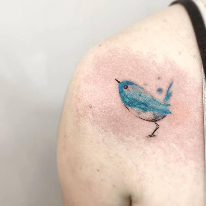 Blue Ink Bird Tattoo by Felipe Mello