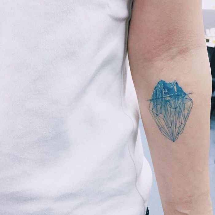 Blue Ink Iceberg Tattoo by Sol Tattoo