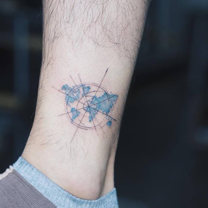 Blue Ink World Map Tattoo by Sol Tattoo