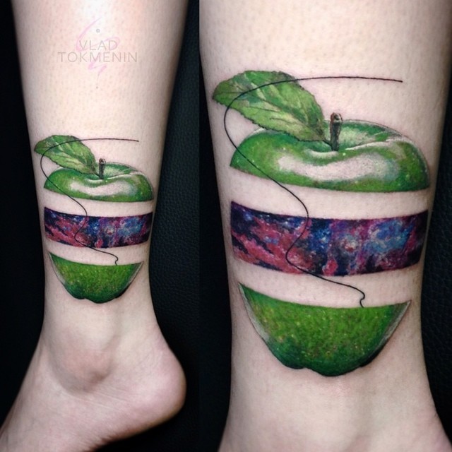 Graphic style apple tattoo above the left ankle by Vlad Tokmenin