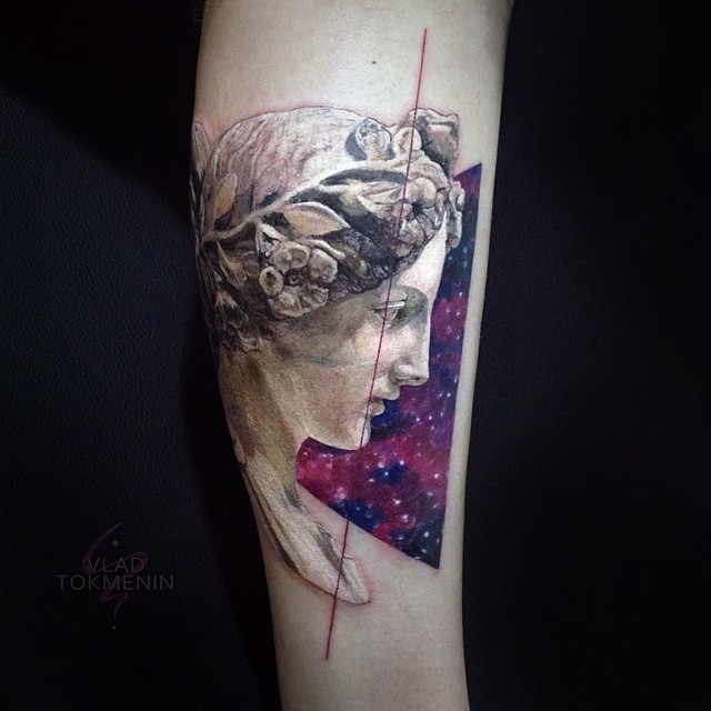 Graphic style bust tattoo on the calf by Vlad Tokmenin