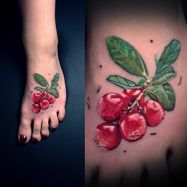 Realistic cranberry tattoo on the left foot by Vlad Tokmenin