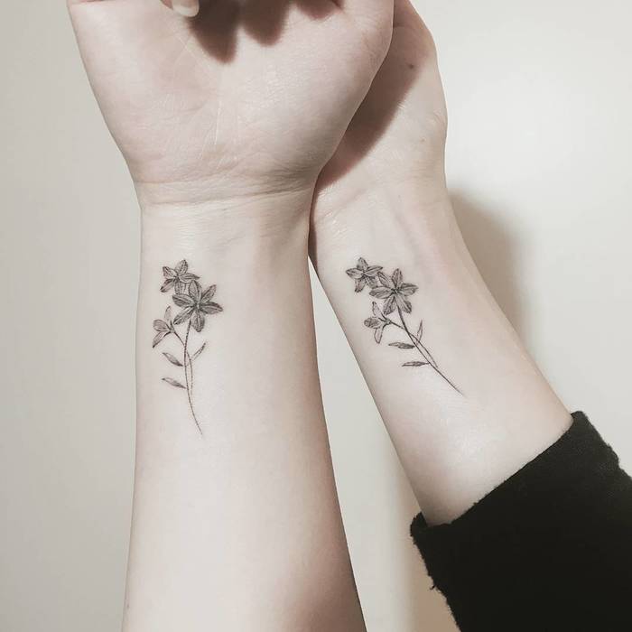 Matching Flowers by tattooist_ty
