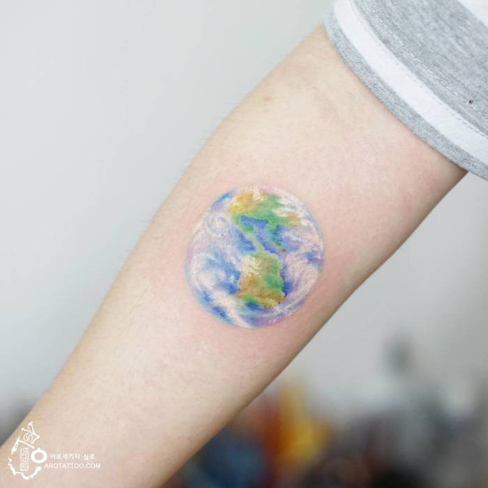 Delicate Earth Tattoo by tattooist_silo
