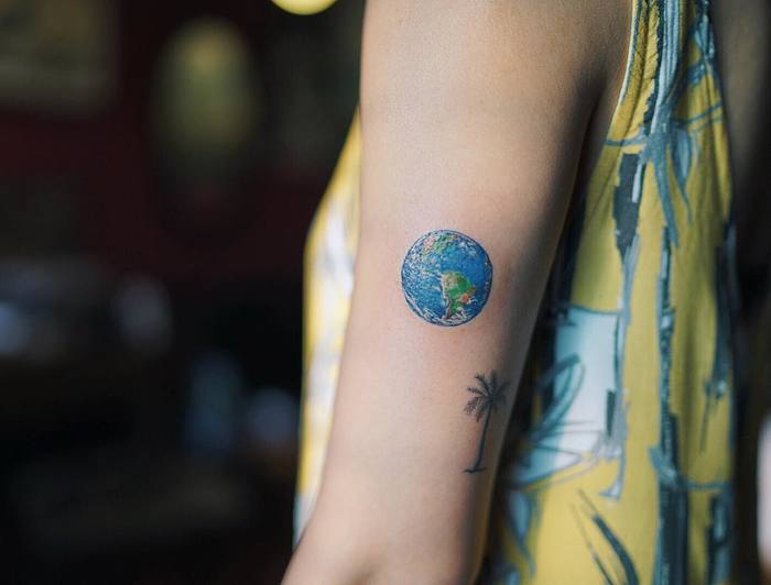 Small Earth Tattoo by nandotattooer