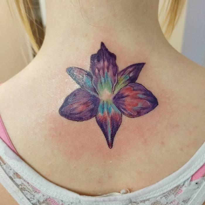 Multicolored Orchid Flower Tattoo by propplewell