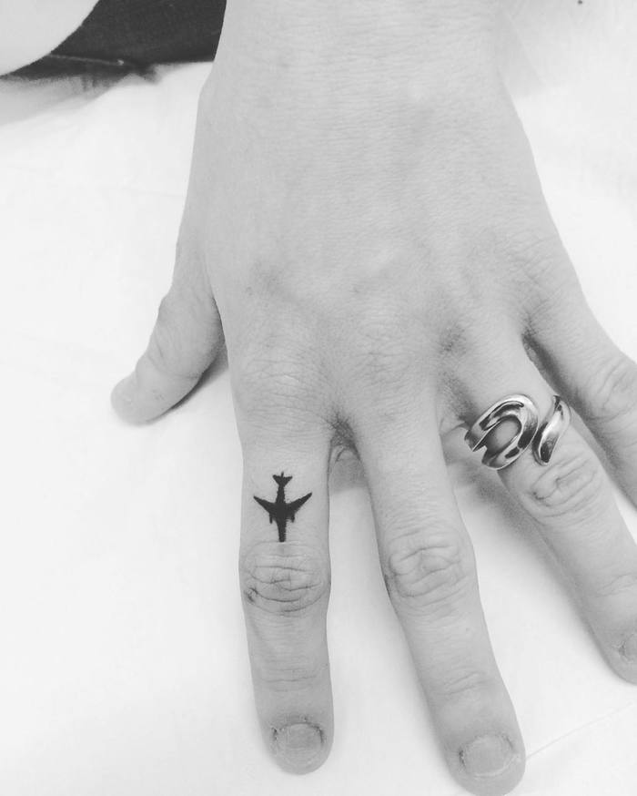 Small Black Ink Airplane Tattoo by kalu_oner