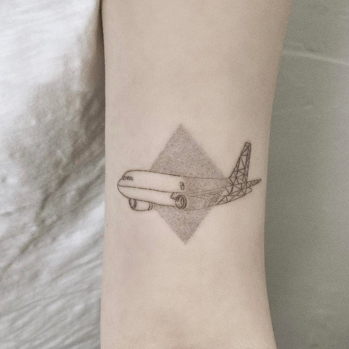 Dotwork and Geometric Airplane Tattoo by tattooist_baka