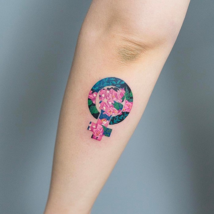 Floral Female Symbol Tattoo by zihee_tattoo