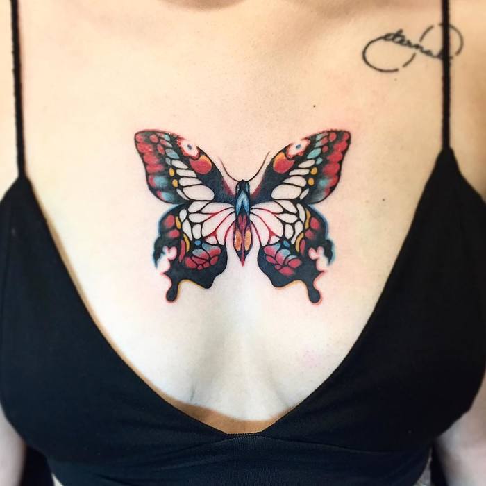 Colored Butterfly Tattoo on Chest by pezzeep